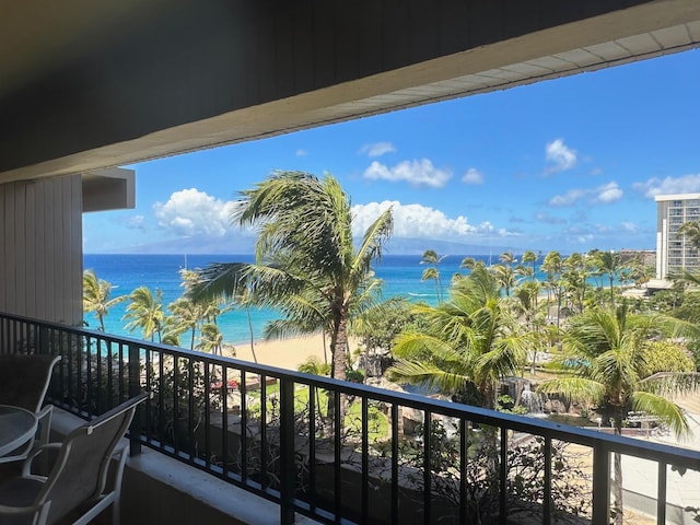 balcony featuring a water view