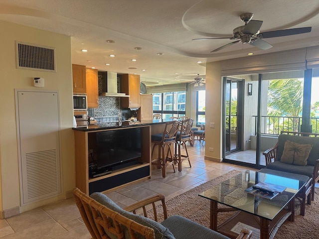 50 Nohea Kai Dr Unit 1-703, Lahaina, HI 96761 - living room featuring a ceiling fan, recessed lighting, and baseboards