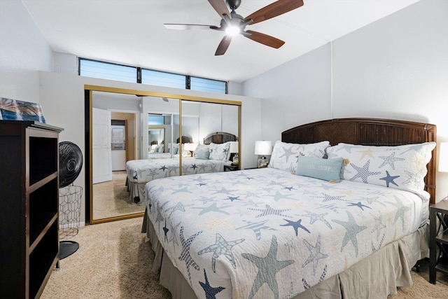 carpeted bedroom with a closet and ceiling fan