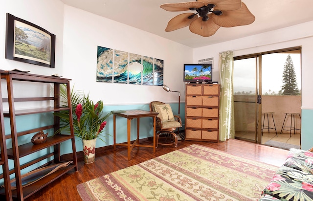 interior space with ceiling fan and dark wood-type flooring