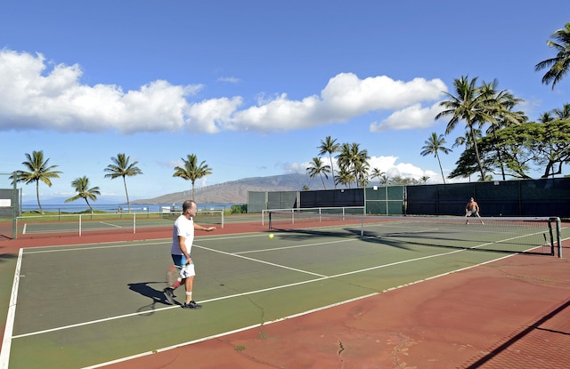 view of sport court featuring a mountain view