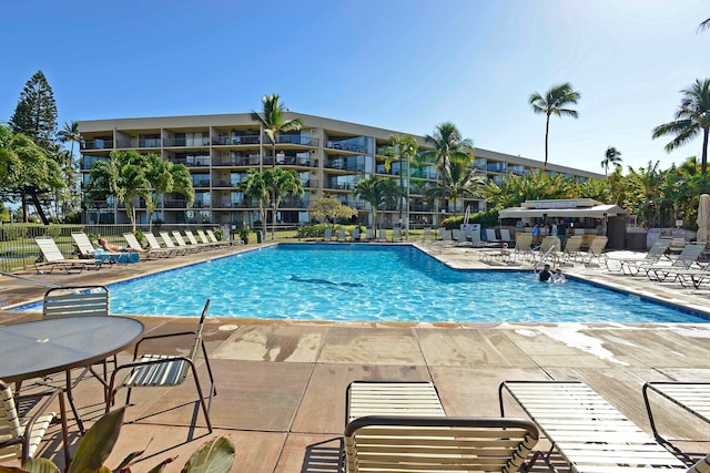 view of swimming pool with a patio area