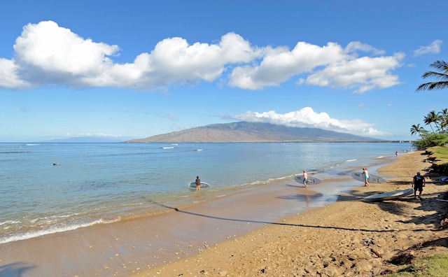 property view of water featuring a beach view and a mountain view