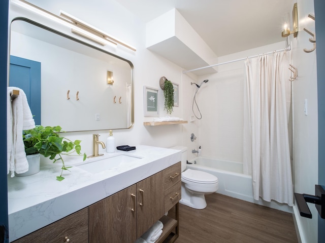 full bathroom with toilet, shower / bathtub combination with curtain, vanity, and wood finished floors