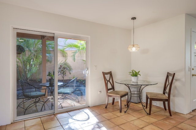 dining room with light tile patterned flooring