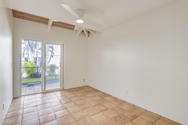 empty room featuring a ceiling fan and beam ceiling