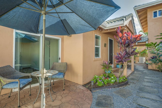 view of patio featuring central AC