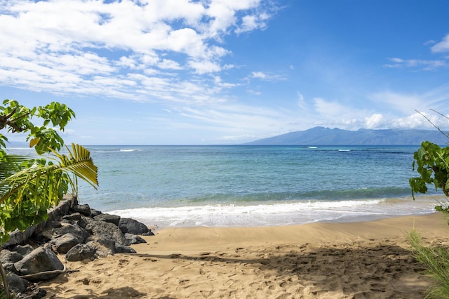 property view of water featuring a beach view