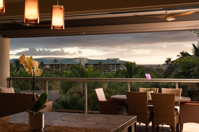 93 Makakehau St Unit G5, Kihei, HI 96753 - balcony at dusk with outdoor dining area