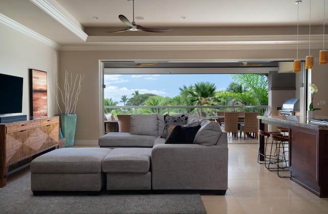 93 Makakehau St Unit G5, Kihei, HI 96753 - living room with ceiling fan, crown molding, light tile patterned floors, and a raised ceiling