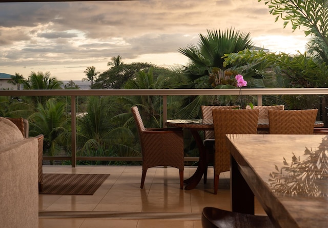 93 Makakehau St Unit G5, Kihei, HI 96753 - balcony at dusk featuring outdoor dining space