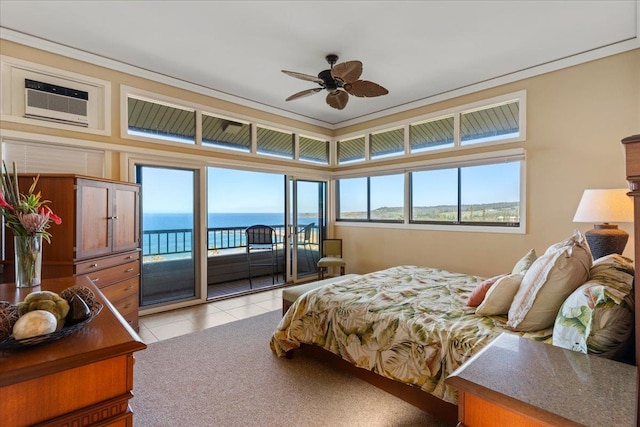 tiled bedroom with a water view, access to exterior, ceiling fan, and a wall unit AC