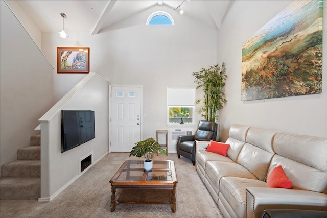 living room with light carpet and high vaulted ceiling