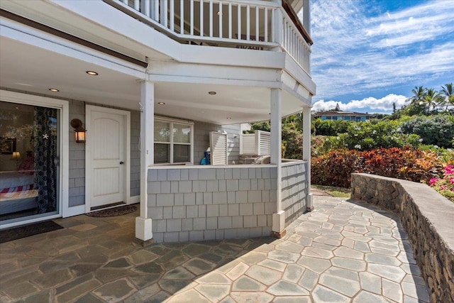 view of patio with a balcony