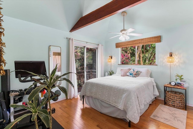 bedroom with lofted ceiling with beams, light hardwood / wood-style floors, access to outside, and ceiling fan