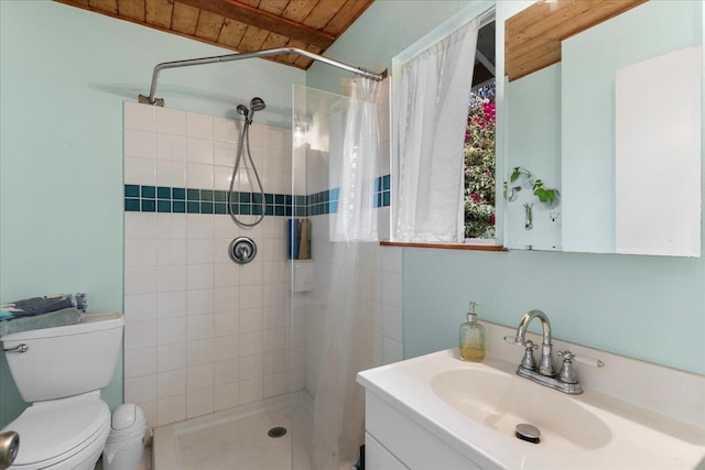 bathroom with vanity, curtained shower, wood ceiling, and toilet