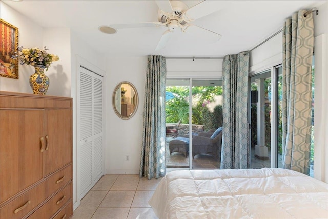 unfurnished bedroom featuring a closet, access to outside, and ceiling fan