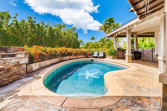 pool with a patio