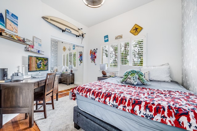 bedroom featuring wood finished floors