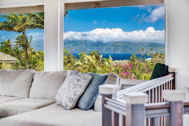 interior space with a mountain view and an outdoor hangout area