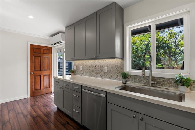 kitchen featuring sink, gray cabinets, and stainless steel dishwasher