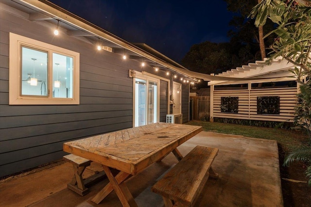 view of patio at twilight