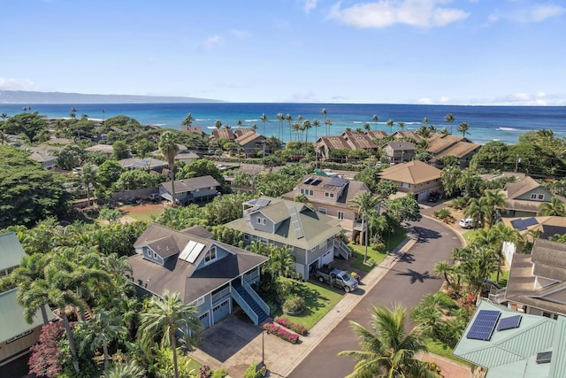 bird's eye view with a water view and a residential view