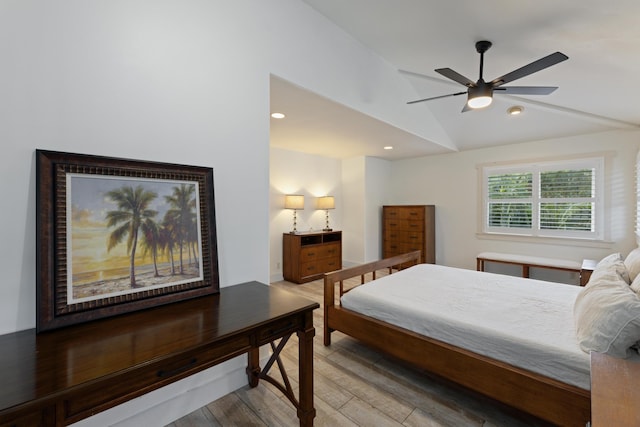 bedroom featuring recessed lighting, light wood-style flooring, a ceiling fan, and lofted ceiling