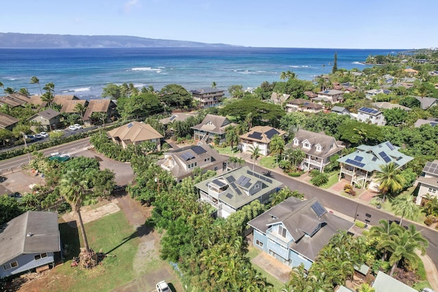 birds eye view of property with a residential view and a water view