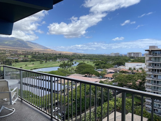 balcony featuring a mountain view