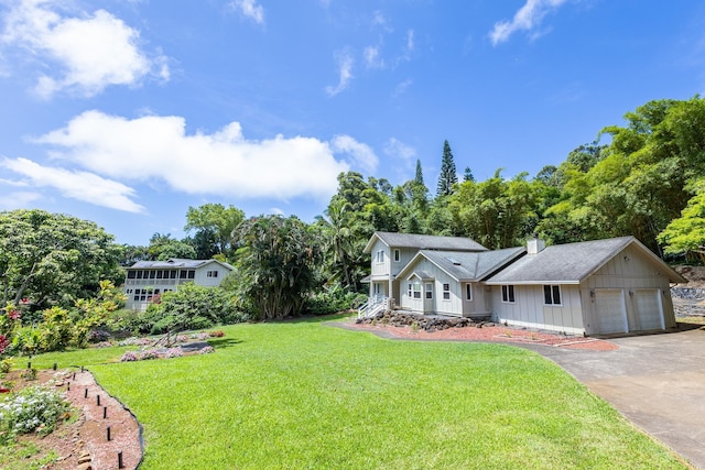 55 Palulu Way Unit A, Haiku, HI 96708 - view of grassy yard with driveway