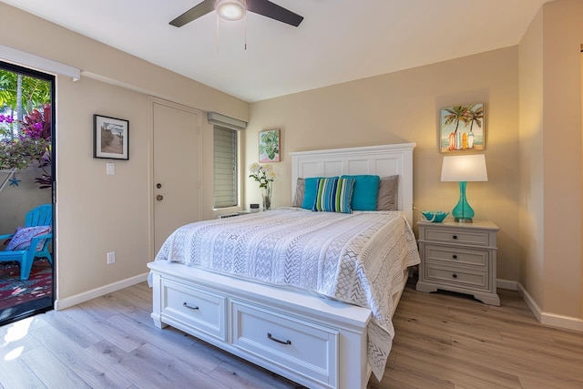 bedroom with ceiling fan and light hardwood / wood-style flooring