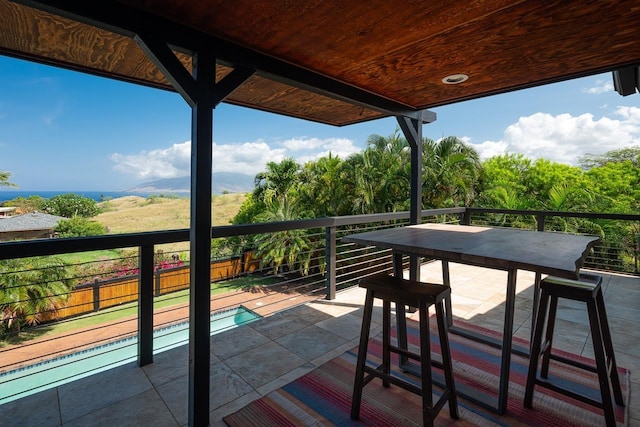 view of patio featuring a fenced in pool