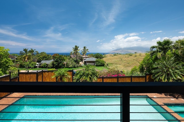 view of pool featuring a mountain view