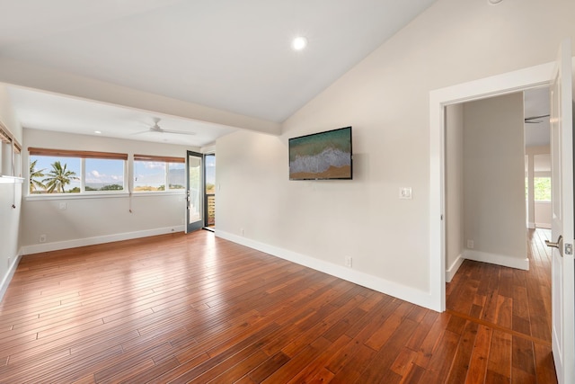 spare room featuring ceiling fan, wood-type flooring, and high vaulted ceiling