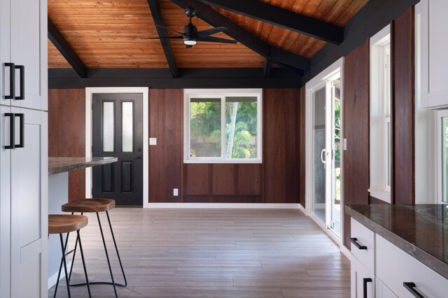 3091 Mapu Pl, Kihei, HI 96753 - entryway with wooden ceiling, a ceiling fan, light wood-style flooring, and wood walls