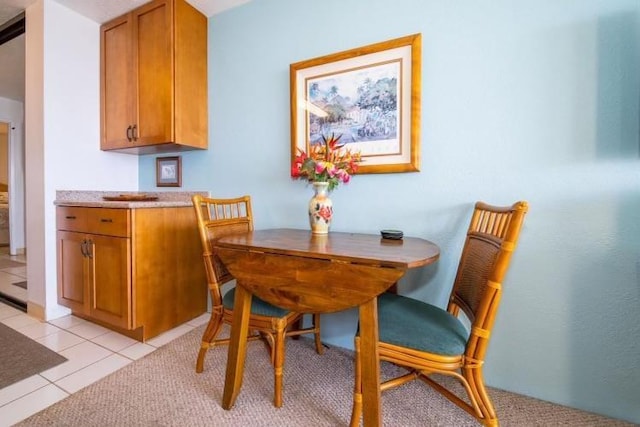 190 Hauoli St Unit 220, Wailuku, HI 96793 - dining area featuring light tile patterned floors