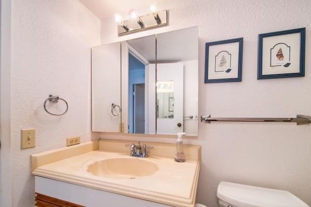 190 Hauoli St Unit 220, Wailuku, HI 96793 - half bathroom featuring toilet and vanity