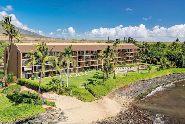 view of building exterior with a mountain view