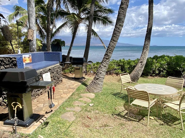 190 Hauoli St Unit 220, Wailuku, HI 96793 - view of yard featuring a water view and a patio area