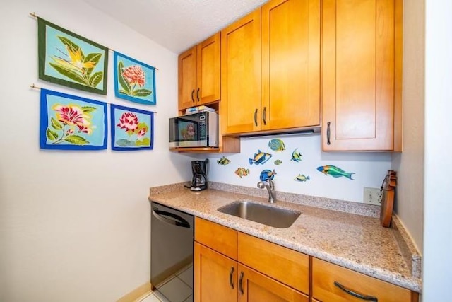 190 Hauoli St Unit 220, Wailuku, HI 96793 - kitchen featuring brown cabinetry, dishwasher, a sink, light stone counters, and stainless steel microwave