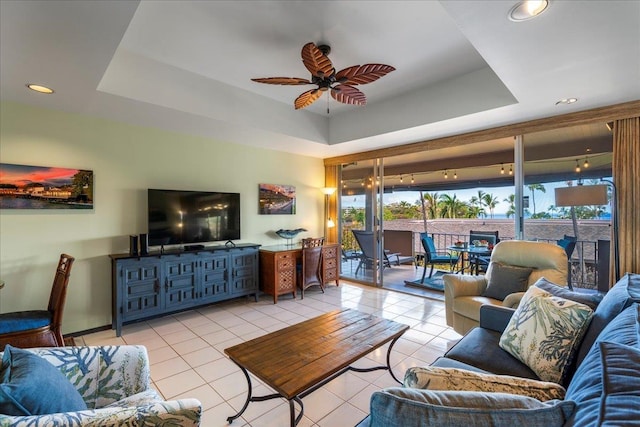 2661 Kekaa Dr Unit L-202, Lahaina, HI 96761 - tiled living area featuring a ceiling fan, a raised ceiling, and recessed lighting