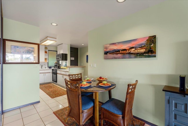 2661 Kekaa Dr Unit L-202, Lahaina, HI 96761 - dining area featuring light tile patterned floors and recessed lighting