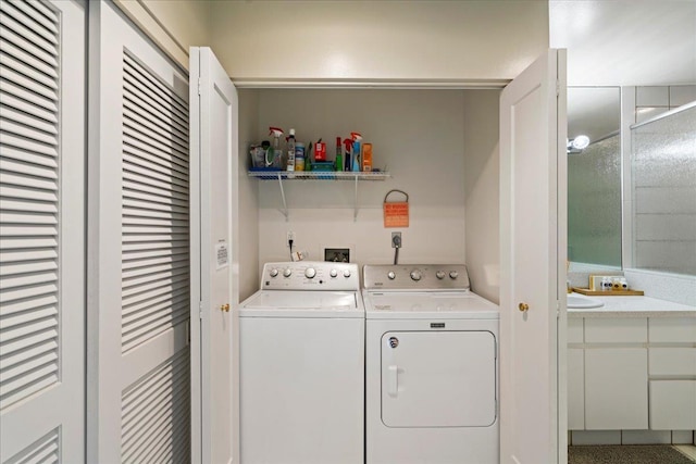 2661 Kekaa Dr Unit L-202, Lahaina, HI 96761 - laundry area featuring washer and dryer