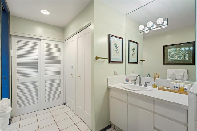 2661 Kekaa Dr Unit L-202, Lahaina, HI 96761 - bathroom featuring vanity, a closet, and tile patterned flooring