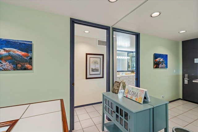 2661 Kekaa Dr Unit L-202, Lahaina, HI 96761 - corridor with light tile patterned flooring, recessed lighting, and baseboards