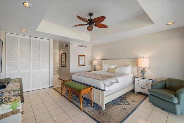 2661 Kekaa Dr Unit L-202, Lahaina, HI 96761 - bedroom featuring a raised ceiling, light tile patterned floors, recessed lighting, a closet, and ceiling fan