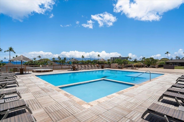 2661 Kekaa Dr Unit L-202, Lahaina, HI 96761 - community pool with a hot tub and a patio