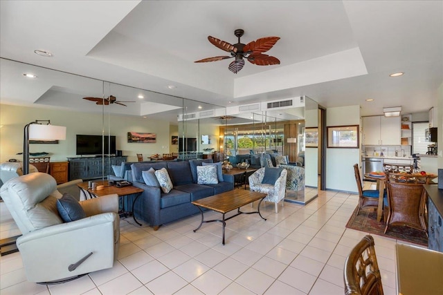 2661 Kekaa Dr Unit L-202, Lahaina, HI 96761 - living area with a ceiling fan, a tray ceiling, light tile patterned floors, and recessed lighting