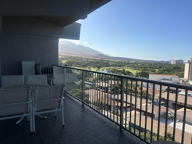 balcony featuring a mountain view